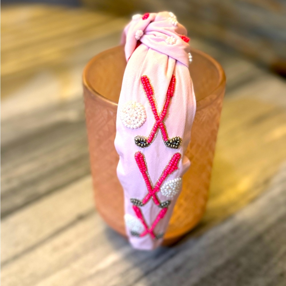 Woman’s pink gold beaded headband